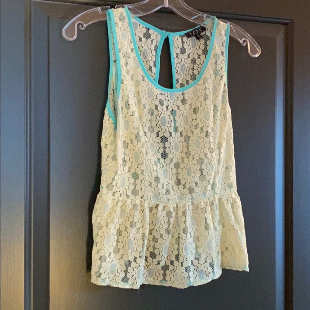 Cream eyelet peplum with sea foam edges